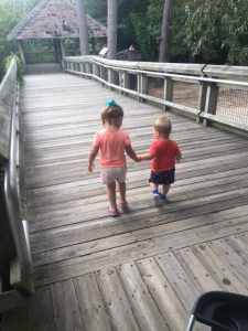 children walking hand in hand