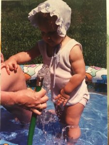 Erin plays in the pool
