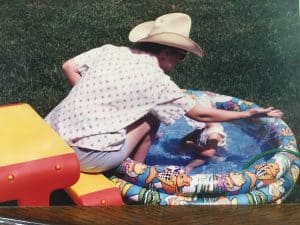 Kelly plays in pool with Erin