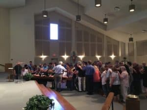 Praying over our missionaries