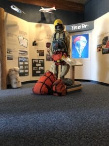 shows smoke jumper uniform in visitor center