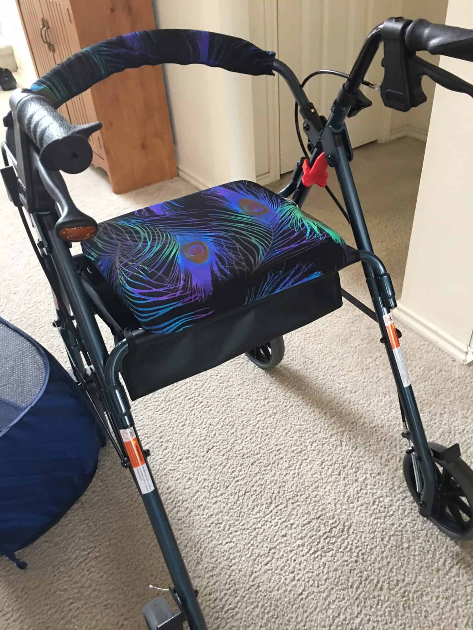 walker with peacock design on seat