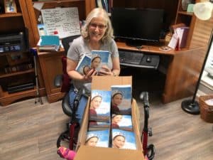 Kelly with author copies